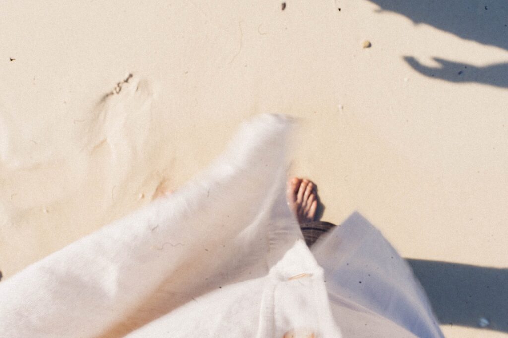 Living in Costa Rica image of woman walking on beach